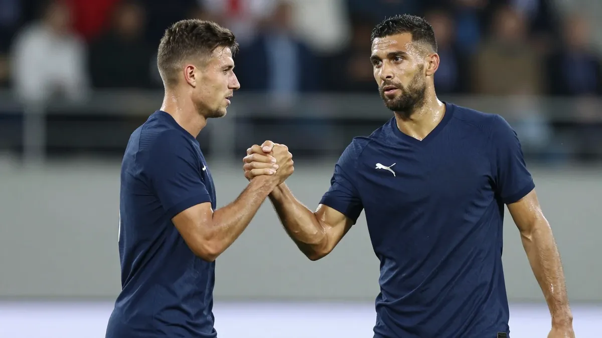 An official Reuters photo shows Le Havre AC and Olympique Lyonnais players before their Ligue 1 match on August 29 at...